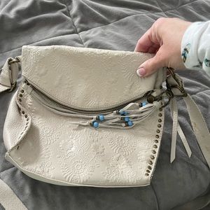 The Sak crossbody in a beautiful winter white leather